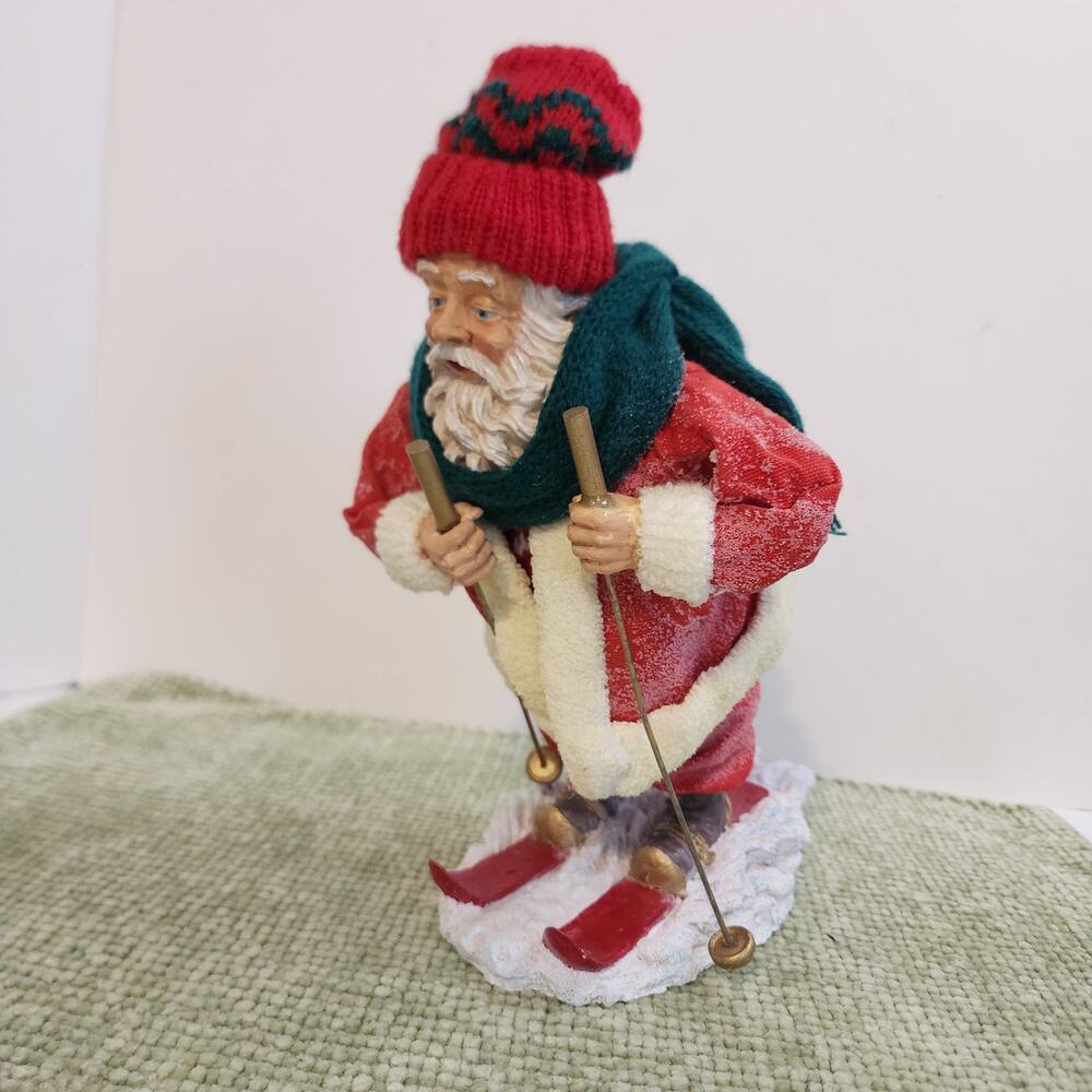 CBK Ltd Skiing Santa Claus Figurine 9.5" Resin Fabric Christmas Ski Lodge Decor
